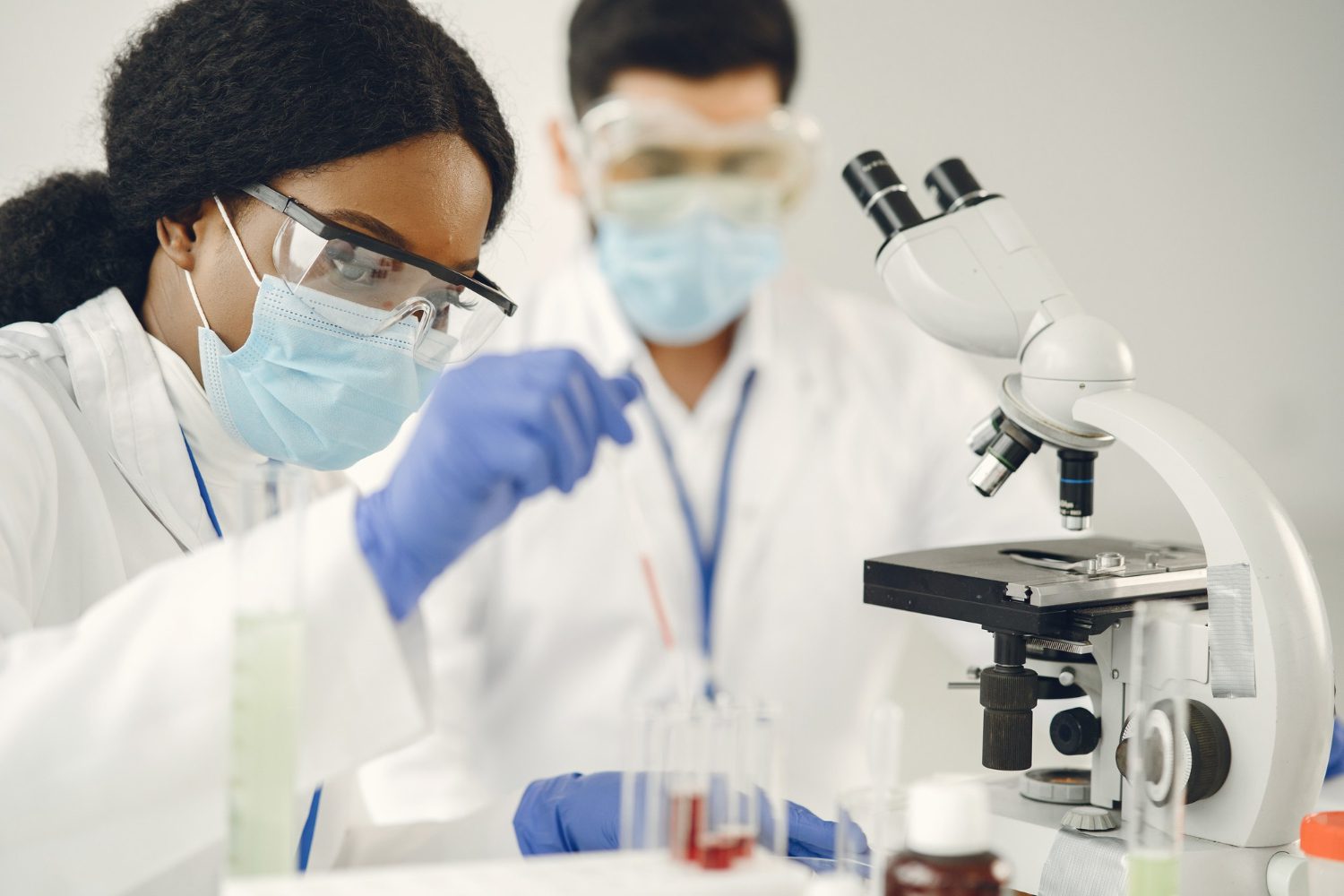 Scientists conducting experiments in a laboratory.